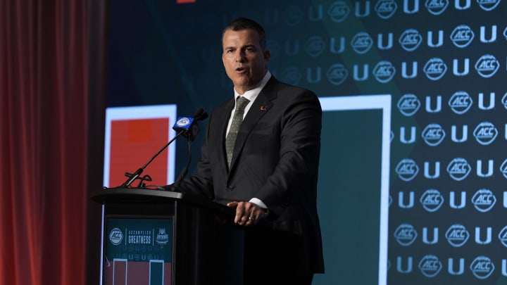 Jul 24, 2024; Charlotte, NC, USA;  Miami Hurricanes head coach Mario Cristobal speaks to the media during the ACC Kickoff at Hilton Charlotte Uptown. Mandatory Credit: Jim Dedmon-USA TODAY Sports