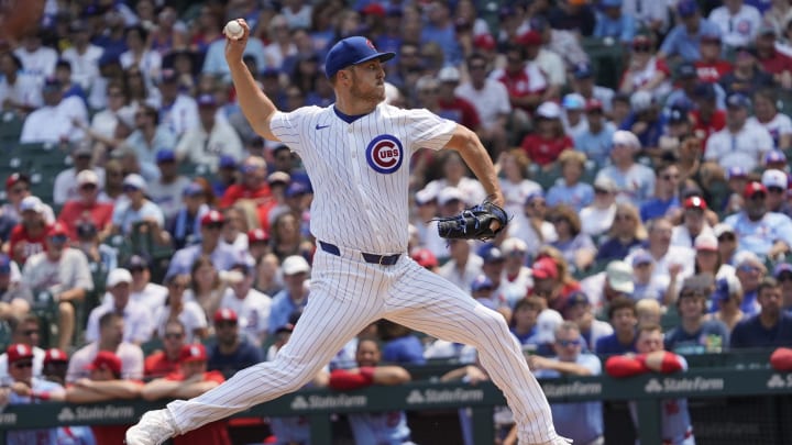 Aug 3, 2024; Chicago, Illinois, USA; Chicago Cubs pitcher Jameson Taillon (50) throws the ball against the St. Louis Cardinals during the first inning at Wrigley Field.