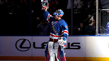 Feb 2, 2025; New York, New York, USA; New York Rangers goalie Jonathan Quick (32) celebrates after his 400th career win following a 4-2 victory against the Vegas Golden Knights at Madison Square Garden. Mandatory Credit: Danny Wild-Imagn Images