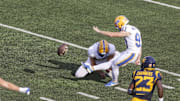 Sep 13, 2025; Morgantown, West Virginia, USA; Pittsburgh Panthers place kicker Trey Butkowski (93) kicks a field goal during the second quarter against the West Virginia Mountaineers at Milan Puskar Stadium. Mandatory Credit: Ben Queen-Imagn Images