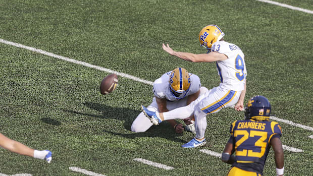 Pittsburgh Panthers place kicker Trey Butkowski (93) kicks a field goal against the West Virginia Mountaineers