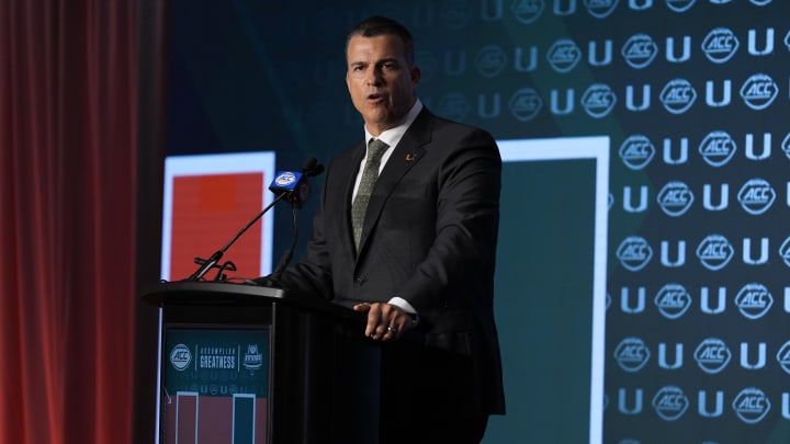 Jul 24, 2024; Charlotte, NC, USA;  Miami Hurricanes head coach Mario Cristobal speaks to the media during the ACC Kickoff at Hilton Charlotte Uptown. Mandatory Credit: Jim Dedmon-USA TODAY Sports