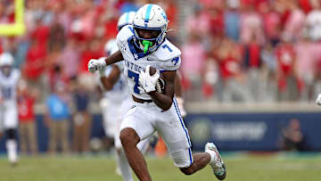 Sep 28, 2024; Oxford, Mississippi, USA; Kentucky Wildcats wide receiver Barion Brown (7) runs after a catch for a first downduring the second half at Vaught-Hemingway Stadium. Mandatory Credit: Petre Thomas-Imagn Images