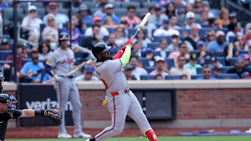 Jul 27, 2024; New York City, New York, USA; Atlanta Braves designated hitter Marcell Ozuna (20) follows through on a solo home run against the New York Mets during the fourth inning at Citi Field. Mandatory Credit: Brad Penner-Imagn Images