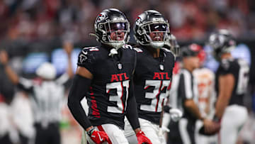 Sep 22, 2024; Atlanta, Georgia, USA; Atlanta Falcons safety Justin Simmons (31) celebrates after an interception against the Kansas City Chiefs in the first quarter at Mercedes-Benz Stadium. Mandatory Credit: Brett Davis-Imagn Images