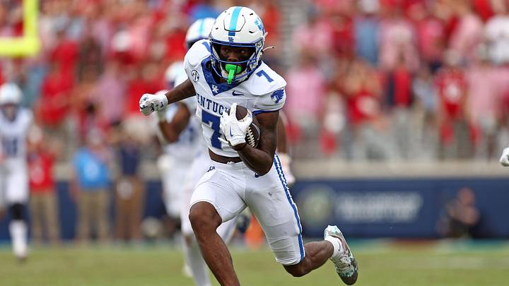 Sep 28, 2024; Oxford, Mississippi, USA; Kentucky Wildcats wide receiver Barion Brown (7) runs after a catch for a first downduring the second half at Vaught-Hemingway Stadium. Mandatory Credit: Petre Thomas-Imagn Images