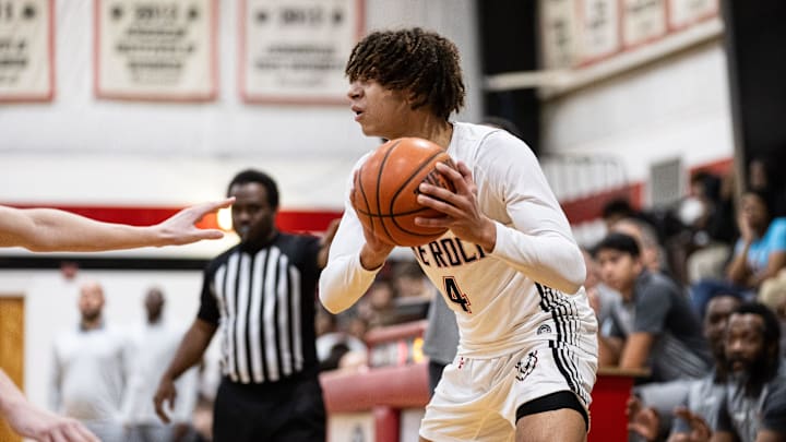 The Rock National Lions guard Clarence Massamba (4) looks to pass against the FSUS Seminoles during the first half at The Rock School in Gainesville, FL on Friday, January 19, 2024. [Matt Pendleton/Gainesville Sun]