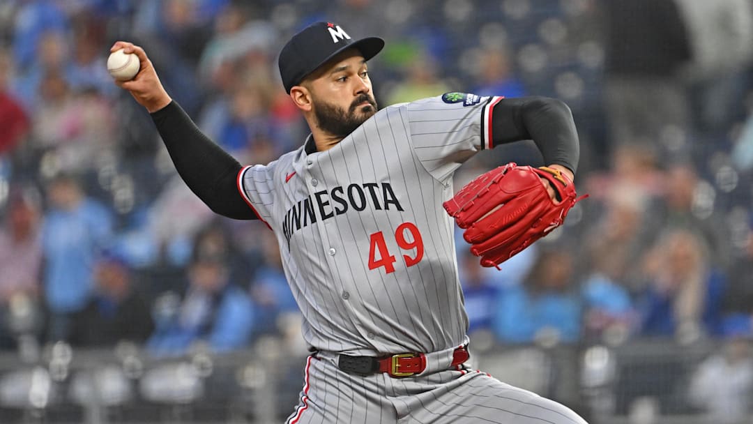 Sep 5, 2025; Kansas City, Missouri, USA;  Minnesota Twins starting pitcher Pablo Lopez (49) throws a pitch in the first inning against the Kansas City Royals at Kauffman Stadium. Mandatory Credit: Peter Aiken-Imagn Images