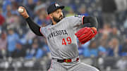 Sep 5, 2025; Kansas City, Missouri, USA;  Minnesota Twins starting pitcher Pablo Lopez (49) throws a pitch in the first inning against the Kansas City Royals at Kauffman Stadium.