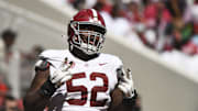Apr 13, 2024; Tuscaloosa, AL, USA;  Alabama offensive lineman Tyler Booker (52) celebrates after the offense scored a touchdown.