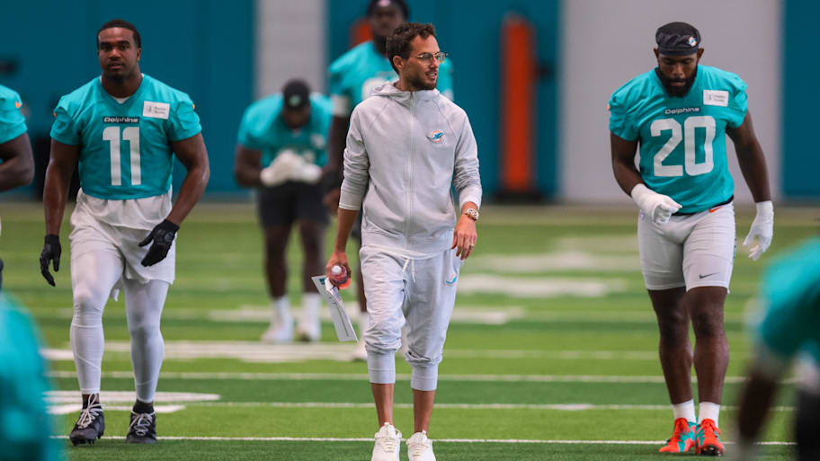 Miami Dolphins head coach Mike McDaniel watches practice during mandatory minicamp at Hard Rock Stadium. | Sam Navarro-Imagn Images