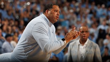 Sean May and Hubert Davis during North Carolina State v North Carolina