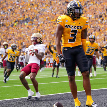 Sep 14, 2024; Columbia, Missouri, USA; Missouri Tigers wide receiver Luther Burden III (3) celebrates after scoring a touchdown against the Boston College Eagles during the first half at Faurot Field at Memorial Stadium. Mandatory Credit: Denny Medley-Imagn Images