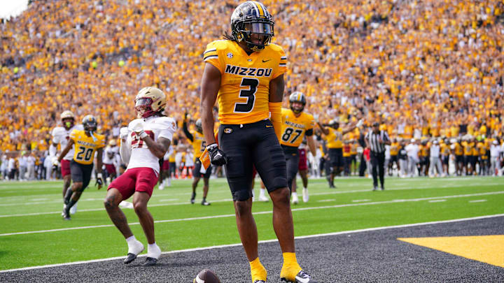 Sep 14, 2024; Columbia, Missouri, USA; Missouri Tigers wide receiver Luther Burden III (3) celebrates after scoring a touchdown against the Boston College Eagles during the first half at Faurot Field at Memorial Stadium. Mandatory Credit: Denny Medley-Imagn Images