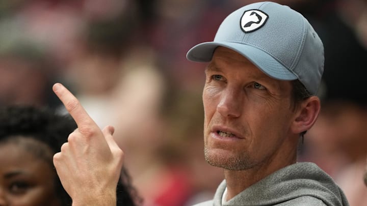 Dec 27, 2025; Stanford, California, USA; Golden State Warriors general manager Mike Dunleavy Jr. sits courtside during the first half of the game between the Stanford Cardinal and the CSUN Matadors at Maples Pavilion. Mandatory Credit: Darren Yamashita-Imagn Images