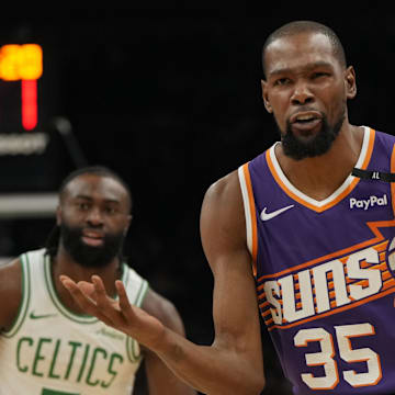 Mar 26, 2025; Phoenix, Arizona, USA; Phoenix Suns forward Kevin Durant (35) reacts after a foul call against the Boston Celtics during the first half at Footprint Center. Mandatory Credit: Rick Scuteri-Imagn Images