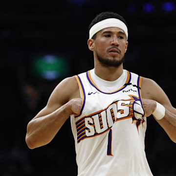 Apr 4, 2025; Boston, Massachusetts, USA; Phoenix Suns guard Devin Booker (1) during the second quarter against the Boston Celtics at TD Garden. Mandatory Credit: Winslow Townson-Imagn Images