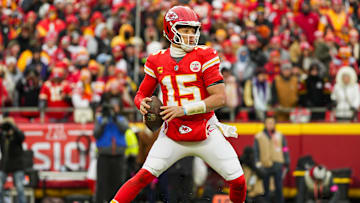 Jan 18, 2025; Kansas City, Missouri, USA; Kansas City Chiefs quarterback Patrick Mahomes (15) drops back to pass during the first half against Houston Texans in a 2025 AFC divisional round game at GEHA Field at Arrowhead Stadium. Mandatory Credit: Jay Biggerstaff-Imagn Images