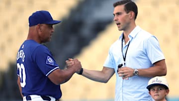 Joe Davis and Dave Roberts meet up before a Los Angeles Dodgers game.