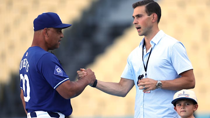 Joe Davis and Dave Roberts meet up before a Los Angeles Dodgers game.