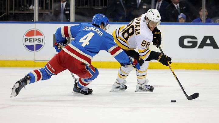 Jan 26, 2026; New York, New York, USA; Boston Bruins right wing David Pastrnak (88) controls the puck against New York Rangers defenseman Braden Schneider (4) during the third period at Madison Square Garden. Mandatory Credit: Brad Penner-Imagn Images Jan 26, 2026; New York, New York, USA; Boston Bruins right wing David Pastrnak (88) controls the puck against New York Rangers defenseman Braden Schneider (4) during the third period at Madison Square Garden. Mandatory Credit: Brad Penner-Imagn Images