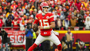 Jan 18, 2025; Kansas City, Missouri, USA; Kansas City Chiefs quarterback Patrick Mahomes (15) drops back to pass during the first half against Houston Texans in a 2025 AFC divisional round game at GEHA Field at Arrowhead Stadium. Mandatory Credit: Jay Biggerstaff-Imagn Images