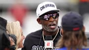 Oct 11, 2025; Boulder, Colorado, USA; Colorado Buffaloes head coach Deion Sanders is interviewed by ESPN during a time out in the first quarter against the Iowa State Cyclones at Folsom Field. Mandatory Credit: Ron Chenoy-Imagn Images