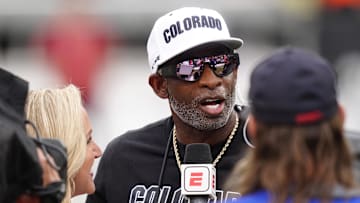Oct 11, 2025; Boulder, Colorado, USA; Colorado Buffaloes head coach Deion Sanders is interviewed by ESPN during a time out in the first quarter against the Iowa State Cyclones at Folsom Field. Mandatory Credit: Ron Chenoy-Imagn Images