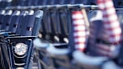 Apr 1, 2021; Kansas City, Missouri, USA; A general view of the Kansas City Royals logo on seats with complimentary flags for fans before the Opening Day game against the Texas Rangers Kauffman Stadium. Mandatory Credit: Denny Medley-Imagn Images