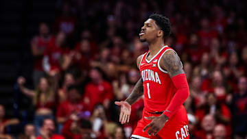 Feb 22, 2025; Tucson, Arizona, USA; Arizona Wildcats guard Caleb Love (1) reacts after dunking the ball during the first half against the BYU Cougars at McKale Center. Mandatory Credit: Aryanna Frank-Imagn Images