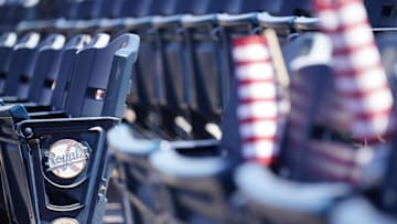 Apr 1, 2021; Kansas City, Missouri, USA; A general view of the Kansas City Royals logo on seats with complimentary flags for fans before the Opening Day game against the Texas Rangers Kauffman Stadium. Mandatory Credit: Denny Medley-Imagn Images