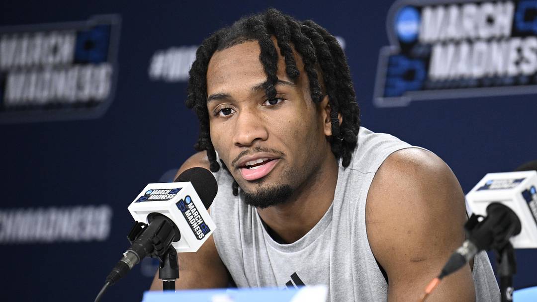 Mar 19, 2026; San Diego, CA, USA; Kansas Jayhawks guard Darryn Peterson (22) speaks at a news conference ahead of the first round of the men's 2026 NCAA Tournament at Viejas Arena. Mandatory Credit: Denis Poroy-Imagn Images