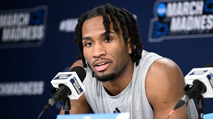 Mar 19, 2026; San Diego, CA, USA; Kansas Jayhawks guard Darryn Peterson (22) speaks at a news conference ahead of the first round of the men's 2026 NCAA Tournament at Viejas Arena. Mandatory Credit: Denis Poroy-Imagn Images