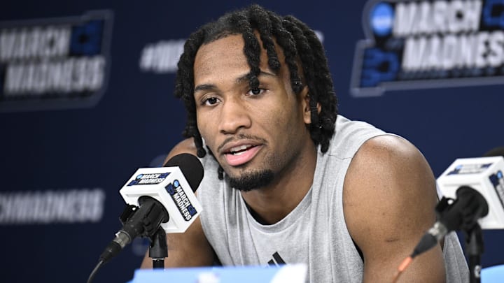 Mar 19, 2026; San Diego, CA, USA; Kansas Jayhawks guard Darryn Peterson (22) speaks at a news conference ahead of the first round of the men's 2026 NCAA Tournament at Viejas Arena. Mandatory Credit: Denis Poroy-Imagn Images