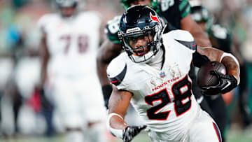 Houston Texans running back Joe Mixon (28) is shown with the ball during the first quarter, Thursday, October 31, 2024, in East Rutherford.