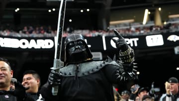 Jan 7, 2024; Paradise, Nevada, USA; A Las Vegas Raiders fan in costume cheers in a game between the