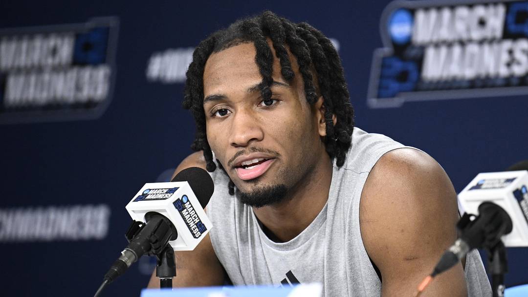 Mar 19, 2026; San Diego, CA, USA; Kansas Jayhawks guard Darryn Peterson (22) speaks at a news conference ahead of the first round of the men's 2026 NCAA Tournament at Viejas Arena. Mandatory Credit: Denis Poroy-Imagn Images