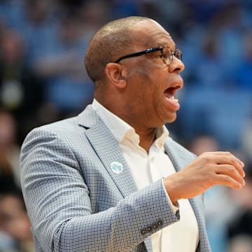 Jan 25, 2025; Chapel Hill, North Carolina, USA;  North Carolina Tar Heels head coach Hubert Davis reacts in the first half at Dean E. Smith Center. Mandatory Credit: Bob Donnan-Imagn Images