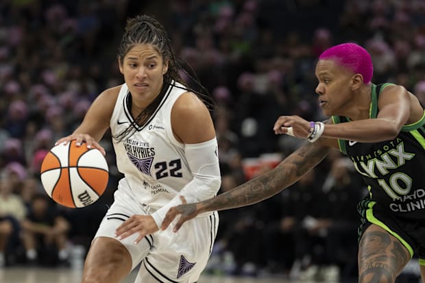 Golden State Valkyries guard Veronica Burton drives to the basket past Minnesota Lynx guard Courtney Williams.