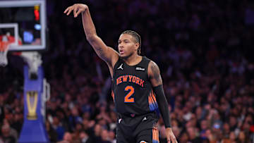 Nov 28, 2025; New York, New York, USA; New York Knicks guard Miles McBride (2) reacts after making a three point basket during the second half against the Milwaukee Bucks at Madison Square Garden. Mandatory Credit: Vincent Carchietta-Imagn Images