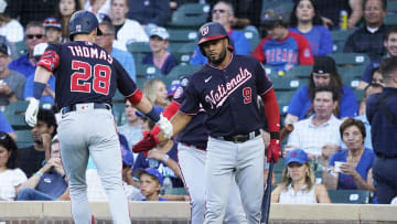 Jul 18, 2023; Chicago, Illinois, USA; Washington Nationals right fielder Lane Thomas (28) is greeted