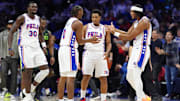 Philadelphia 76ers guard Tyrese Maxey, second from left, reacts with guard Kyle Lowry, center, and guard Ricky Council IV, right, against the Boston Celtics in the second quarter at Wells Fargo Center in Philadelphia on Feb. 2, 2025.