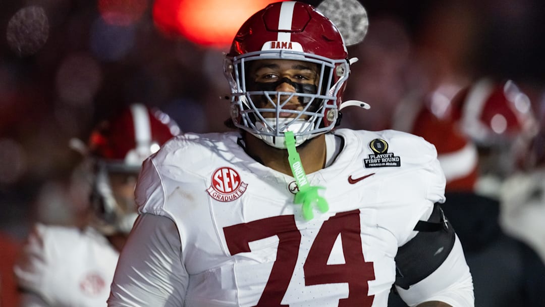 Dec 19, 2025; Norman, OK, USA; Alabama Crimson Tide offensive lineman Kadyn Proctor (74) against the Oklahoma Sooners during the CFP National Playoff First Round at Gaylord Family Oklahoma Memorial Stadium.