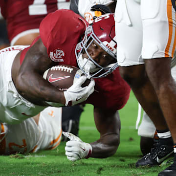 Oct 18, 2025; Tuscaloosa, Alabama, USA; Alabama Crimson Tide running back Jam Miller (26) inches toward the goal line in the first quarter against the Tennessee Volunteers at Saban Field at Bryant-Denny Stadium. Mandatory Credit: David Leong-Imagn Images