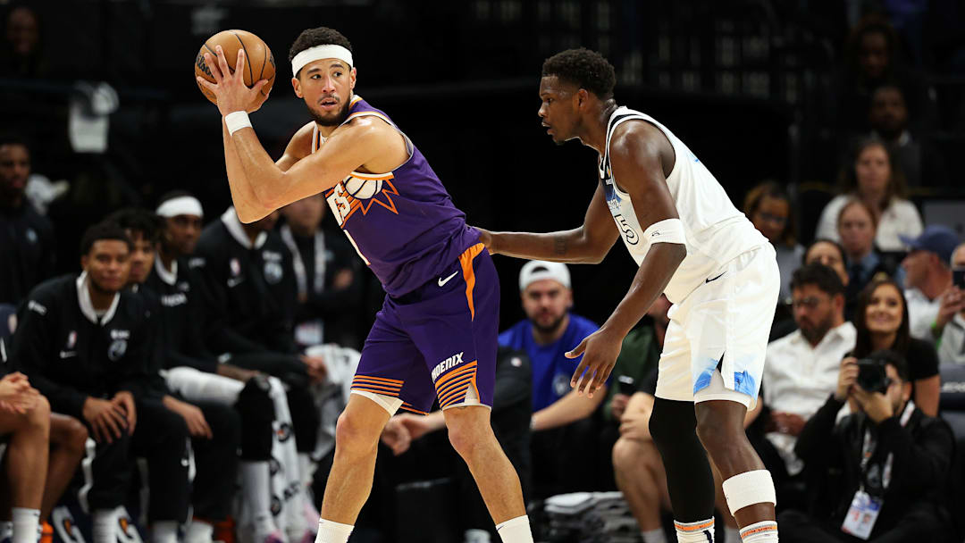 Suns' Devin Booker (left) pictured alongside Wolves' Anthony Edwards (right)