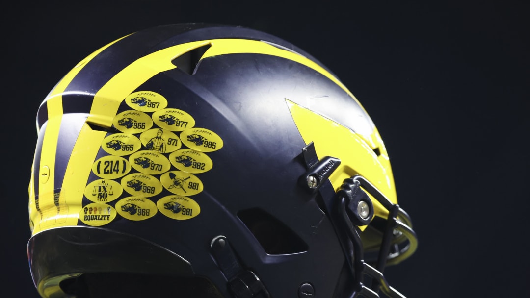Dec 3, 2022; Indianapolis, Indiana, USA; A Michigan Wolverines player   s helmet before the Big Ten Championship against the Purdue Boilermakers at Lucas Oil Stadium. Mandatory Credit: Trevor Ruszkowski-USA TODAY Sports