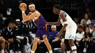 Suns' Devin Booker (left) pictured alongside Wolves' Anthony Edwards (right)