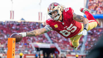 November 9, 2025; Santa Clara, California, USA; San Francisco 49ers tight end George Kittle (85) scores a touchdown during the fourth quarter against the Los Angeles Rams at Levi's Stadium. Mandatory Credit: Kyle Terada-Imagn Images