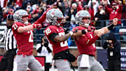 Oct 25, 2025; Pullman, Washington, USA; Washington State Cougars quarterback Zevi Eckhaus (4) leads a touchdown celebrates against the Toledo Rockets in the first half at Gesa Field at Martin Stadium. Mandatory Credit: James Snook-Imagn Images