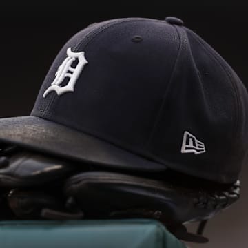 Jul 30, 2021; Detroit, Michigan, USA; The hat and glove of Detroit Tigers right fielder Robbie Grossman (8) sits on the ledge of the dugout during the first inning against the Baltimore Orioles at Comerica Park. 
